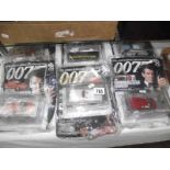 6 sealed James Bond magazines with die cast cars.
