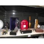 A shelf of miscellaneous including lacquered boxes, glass dancers, figure etc.