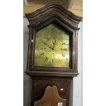 A brass faced 8 day Grandfather clock, Mosley C London, Malbemarle SW.