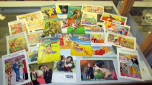 A mixed lot of vintage humorous postcards.