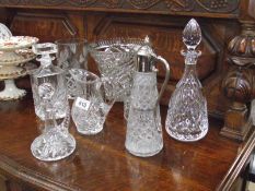 A quantity of crystal decanters,