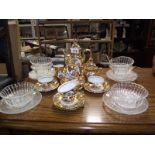 A vintage 15 piece gold coffee set and a 12 piece dessert setting,