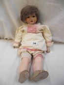 A good old 'Mama' doll in fair condition for age and Mama works.