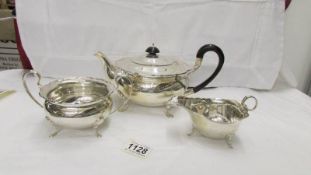 A silver Walker and Hall teapot (639g) and a silver Walker and Hall sugar basin (250g) both