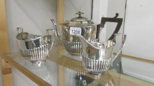 A 3 piece silver plate tea set by J H Potter, Sheffield.