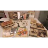 A mixed lot of old postcards, 19th century photographs, ephemera etc.