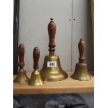 4 wooden handles brass bells
