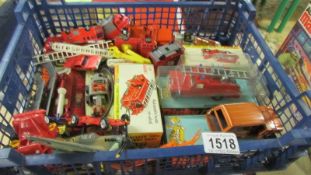 A quantity of Dinky fire engines, military vehicles, hovercroft etc.
