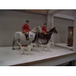 2 Beswick horses with 2 hounds (grey horse has leg repair and other horse has head and foot repair)