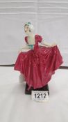 A Royal Doulton figurine 'Delight', Reg. No. 814285.