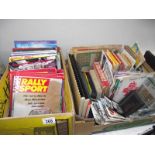 An interesting lot of maps, postcards, motoring books, speedway programmes, old radios etc.