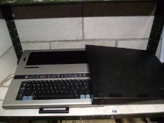 A Silver Reed EX44 electric typewriter.