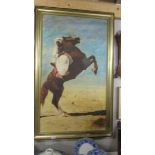 A large framed study of an Arab on a horse.