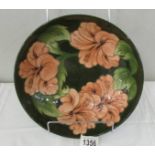 A Walter Moorcroft signed green 'Coral Hibiscus' bowl, circa 1970's.