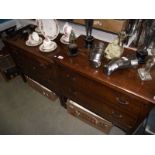 A 1930/50's oak ply chest of drawers.