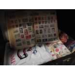 A vintage case of stamps, albums, FDC's, ephemera etc.