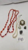 A mixed lot of jewellery including cameo brooch, pearls etc.