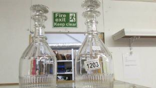 A pair of 19th century glass decanters.