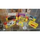 8 boxed Corgi's including Austin Metro, London Taxi, Sunbeam Imp, Heinkel bubble car etc.