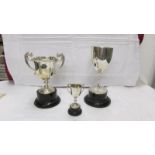 2 large silver trophies and a smaller example, approximately 300 g total.