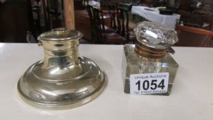 A silver plate inkwell together with a glass inkwell (top a/f).