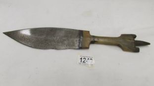 An old hunting knife with horn handle.