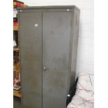 A metal 2 door locker cabinet.