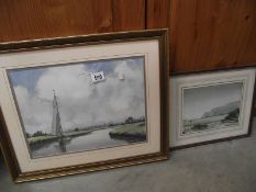 2 framed and glazed watercolours 'Sailing on the Broads' and 'Rocky Beach' both signed Graham