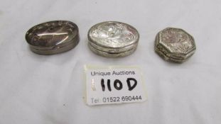 3 hall marked silver pill boxes.