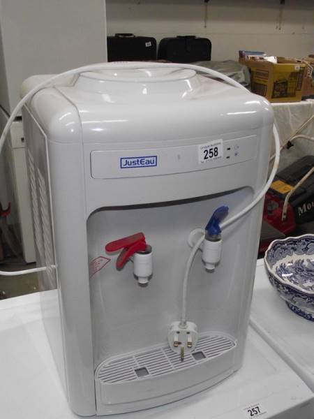 A Just Eau water dispenser.