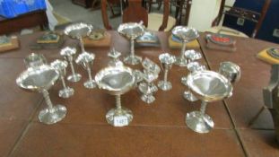 A mixed lot of silver plate goblets, condiments etc.