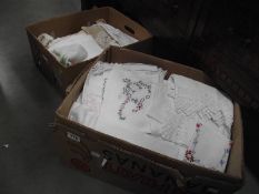 2 boxes of vintage household textiles including embroidered linens.