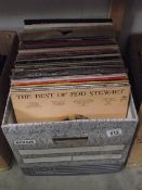 A box of LP records including The Police, Rod Stewart, The Eurythmics etc.