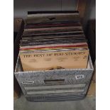 A box of LP records including The Police, Rod Stewart, The Eurythmics etc.