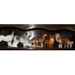 7 ceramic dogs (Beswick Corgi has damaged ear)