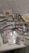 A mixed lot of UK and world stamps.