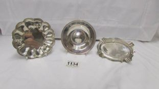 A silver ashtray, a silver sweet meat dish and a silver commemorative dish for H F Parker 1951-1976,