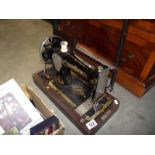 A vintage Singer sewing machine (no lid)