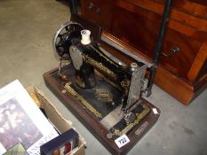 A vintage Singer sewing machine (no lid)