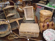 A good lot of wicker baskets, carpet beater and a corner unit.