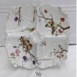A hand painted Limoges hors d'ouvre dish decorated with exotic birds.