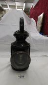 A Railway signal lamp stamped 17591.