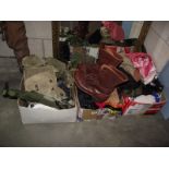 A large selection of military items including boots, scarves, magazines etc.