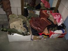 A large selection of military items including boots, scarves, magazines etc.