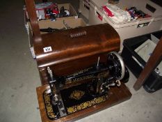 A vintage 'New Ideal D' sewing machine from the Home Sewing Machine Co.