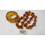 An amber style necklace with matching bracelet.