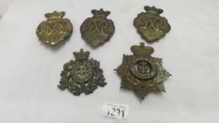 5 large hat/shako badges including Waterloo 19th regiment,