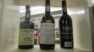 3 bottles of vintage port being Grahams 1983, Croft 1977 and Ferreira 1978.