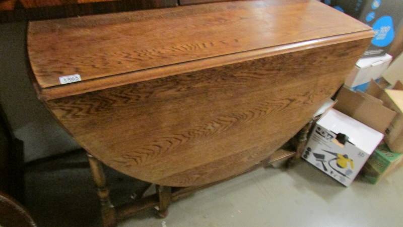 An oak gate leg table.