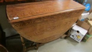 An oak gate leg table.